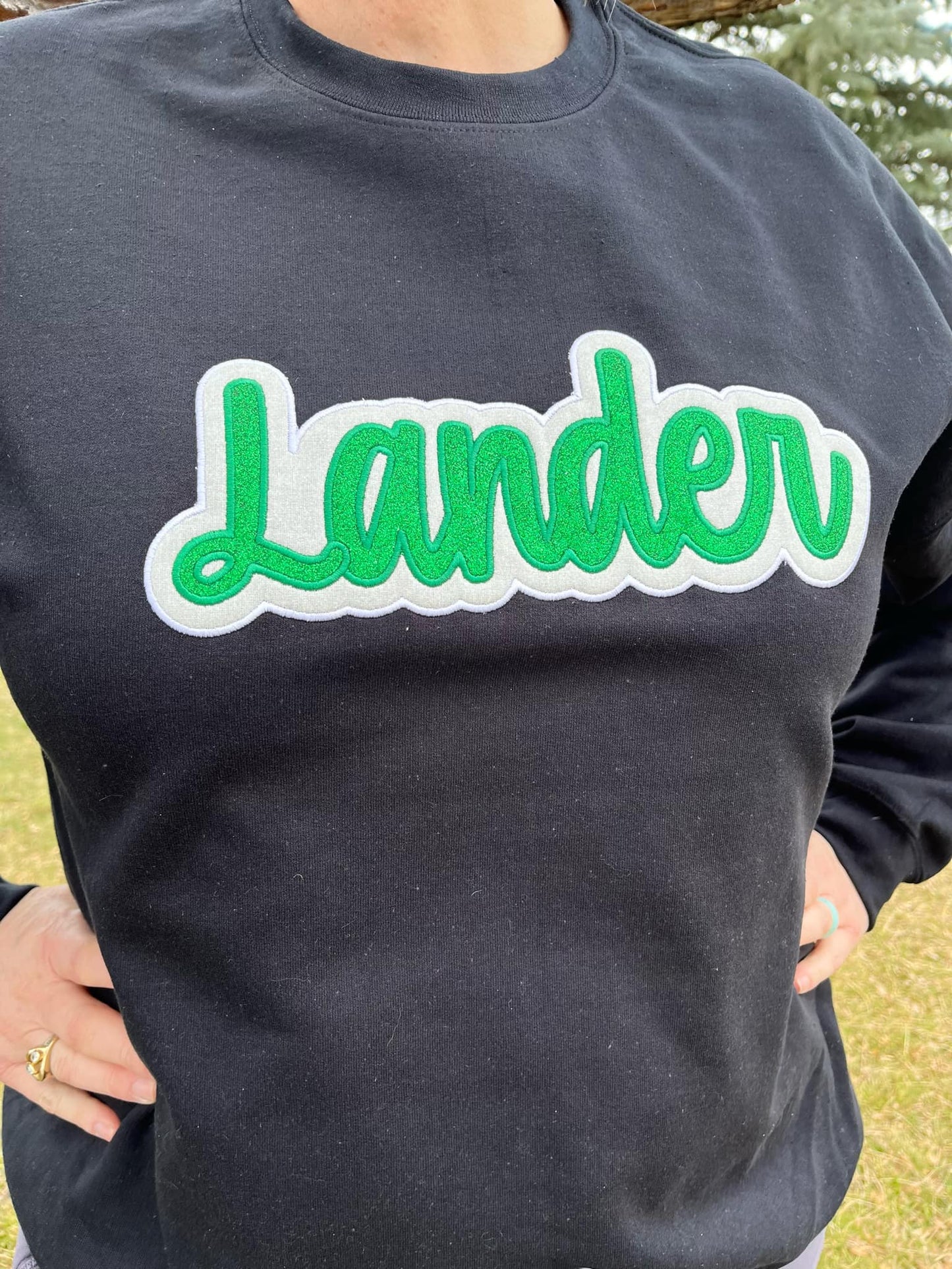 Lander Green and White Glitter Applique Embroidery on Black Crewneck