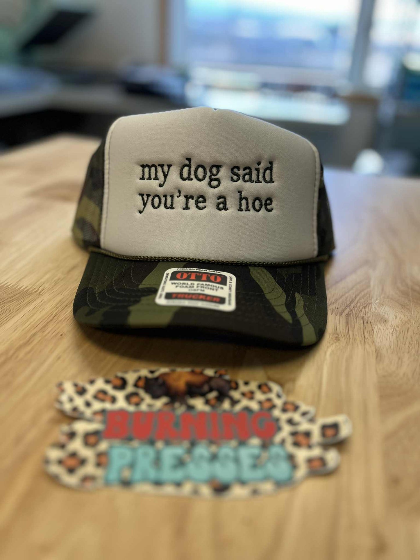 My dog said you're a hoe embroidered trucker hat