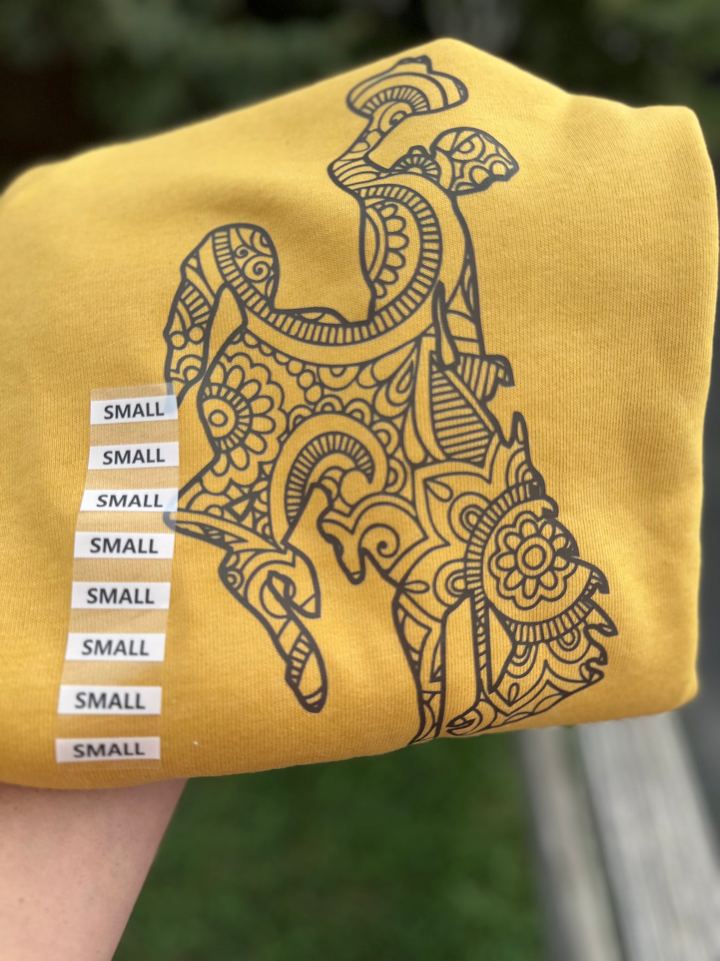 Wyoming Bucking horse on gold long sleeves or crewneck